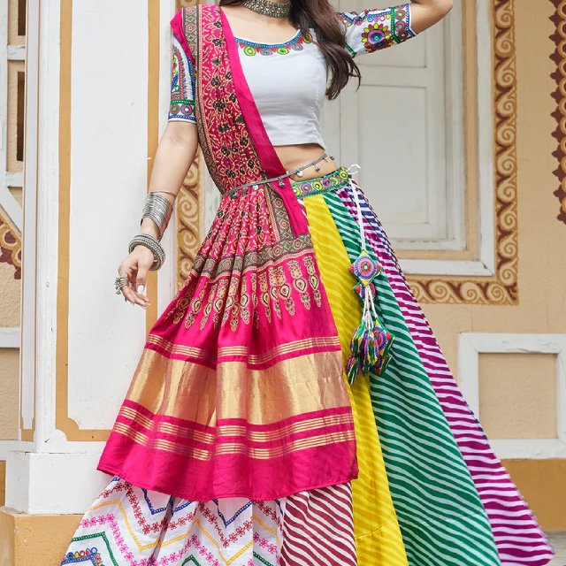 Designer chaniya choli with mirror work by Nirali Boutique